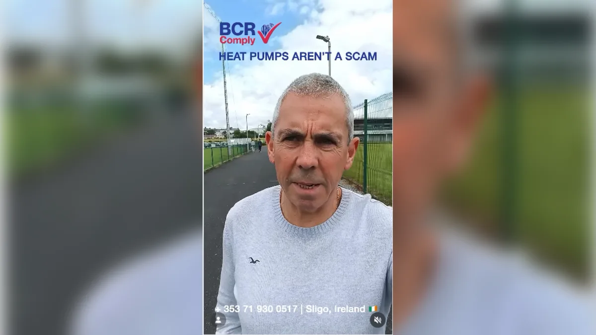 Tom from BCR Comply at a GAA pitch discussing heat pump myths and Mayo's 2026 All-Ireland triumph